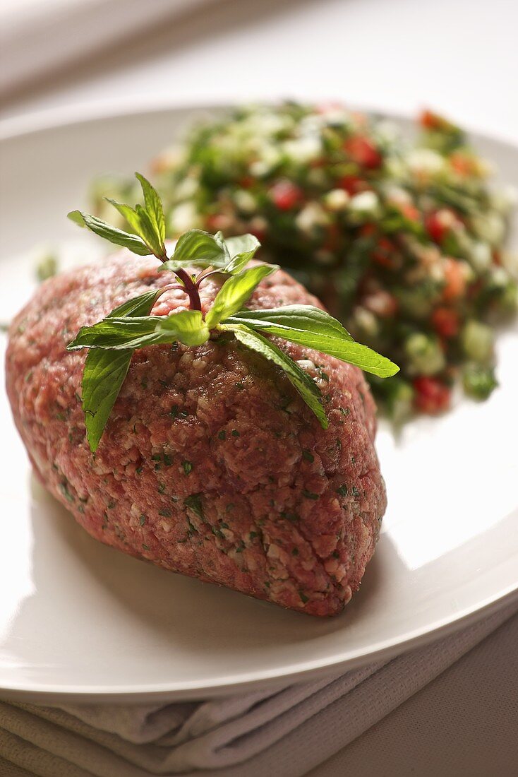 Kibbeh nayeh (minced lamb) with tabbouleh (Lebanon)