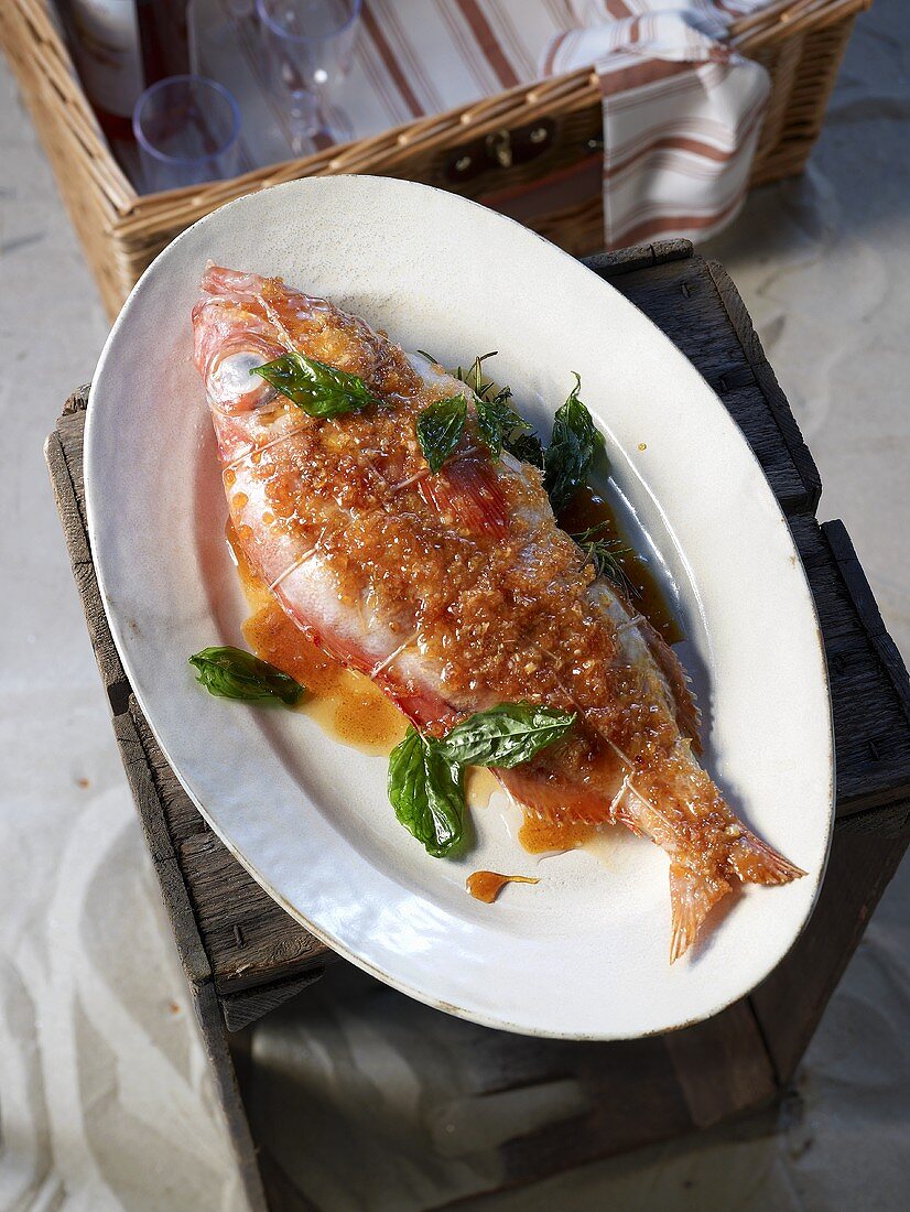 Grilled snapper with herbs and a lemon glaze