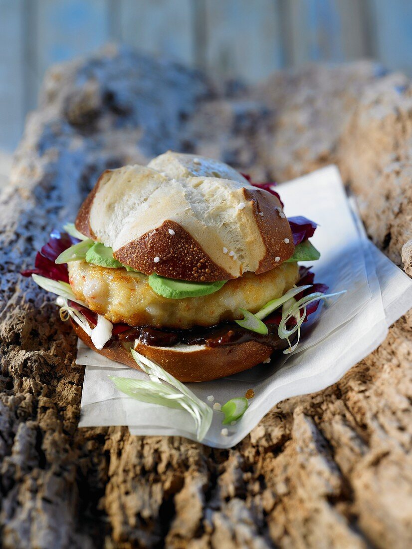 A lye roll with langostines, radicchio and avocado