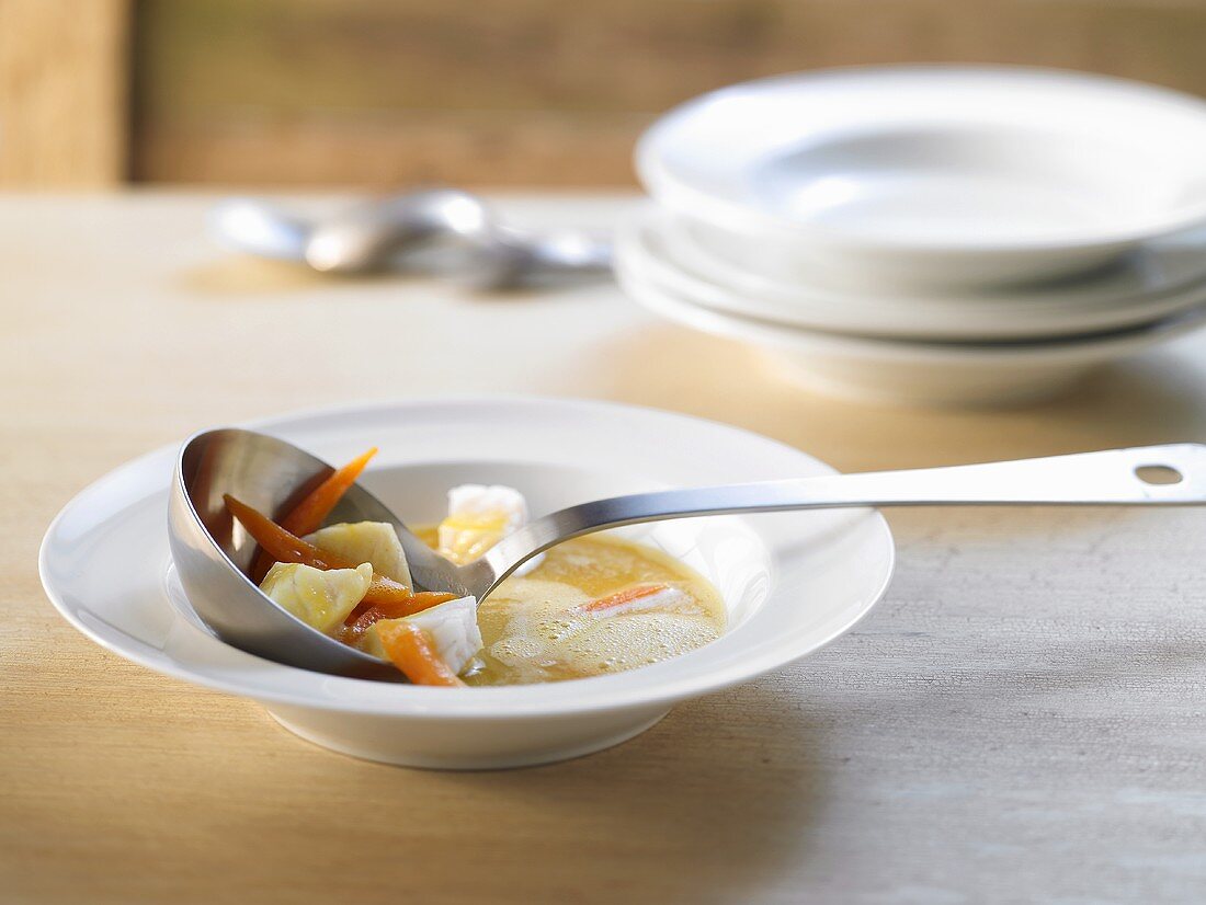 Fish soup with carrots