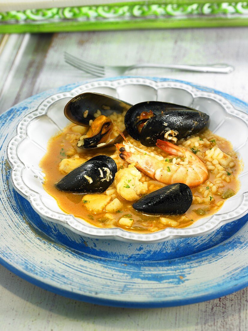 Arroz caldoso (rice stew, Spain) with mussels and prawns