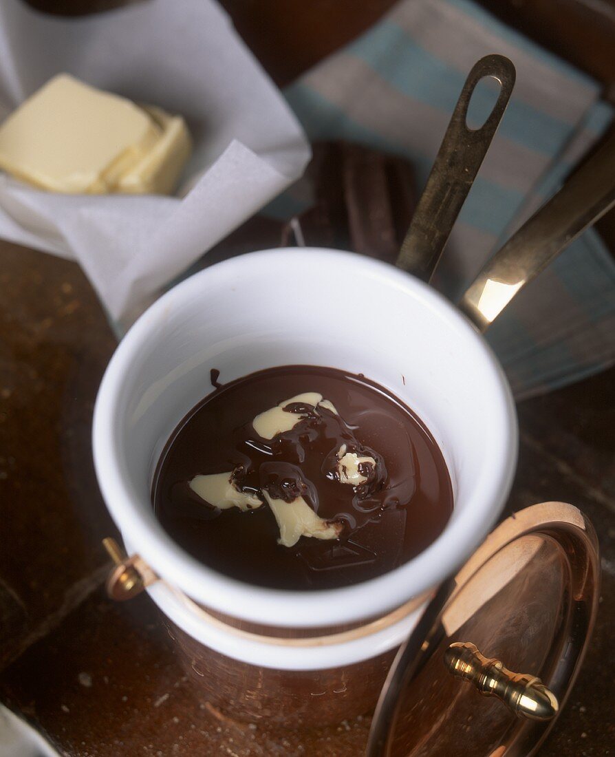 Chocolate cream being made for a chocolate cake