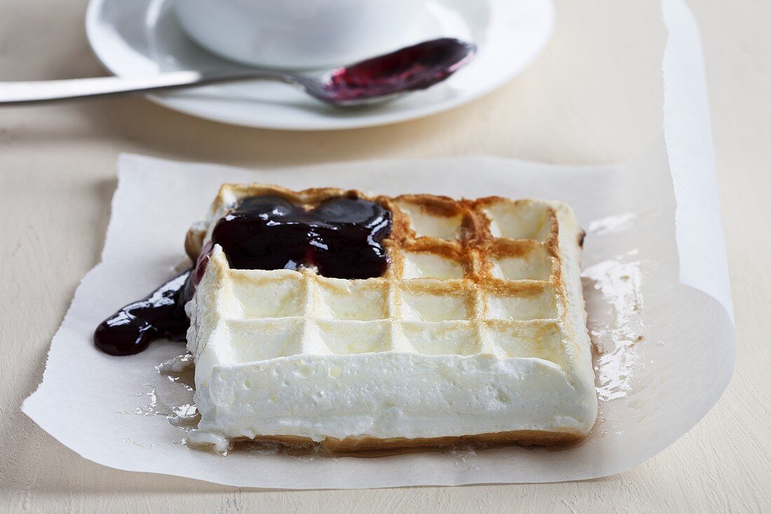 Meringue waffles with blueberry sauce