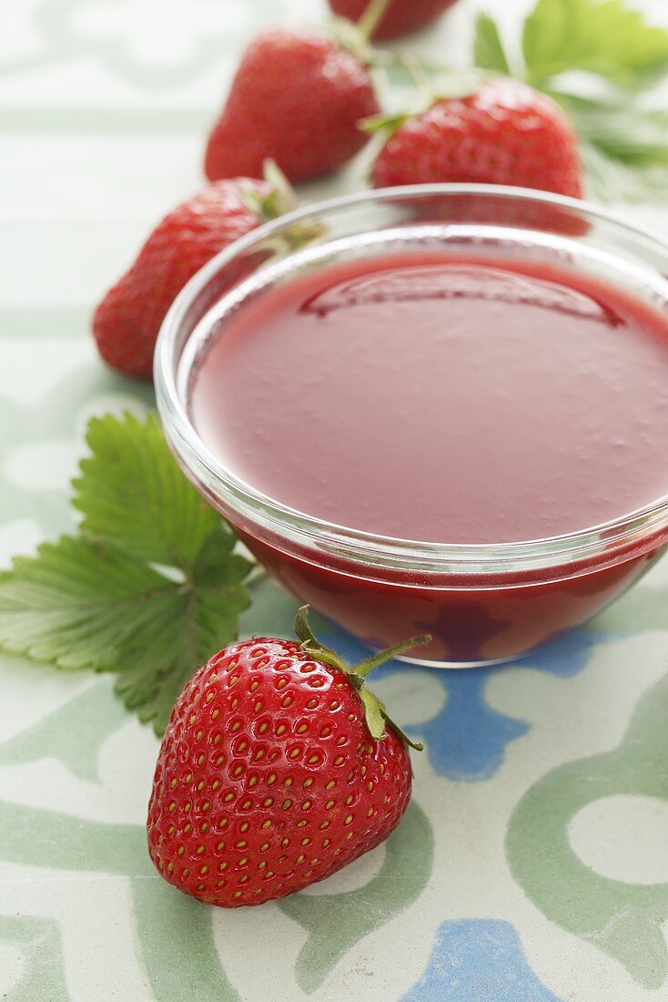Strawberry sauce and fresh strawberries
