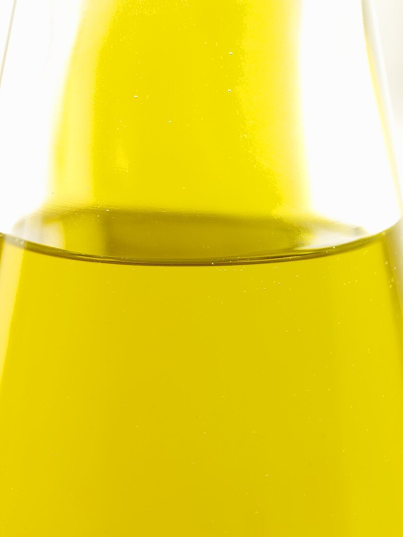 A bottle of olive oil (close-up)