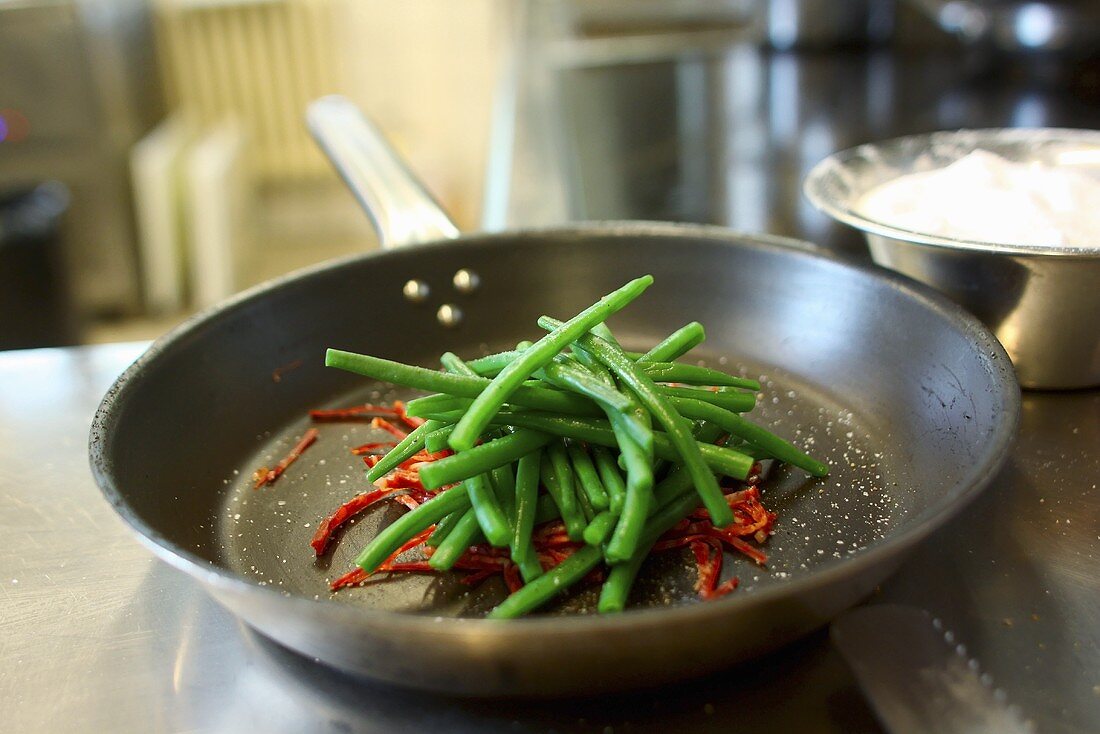 Green beans and pepper in the hotel kitchen Chateau Mcely (Czech Republic)