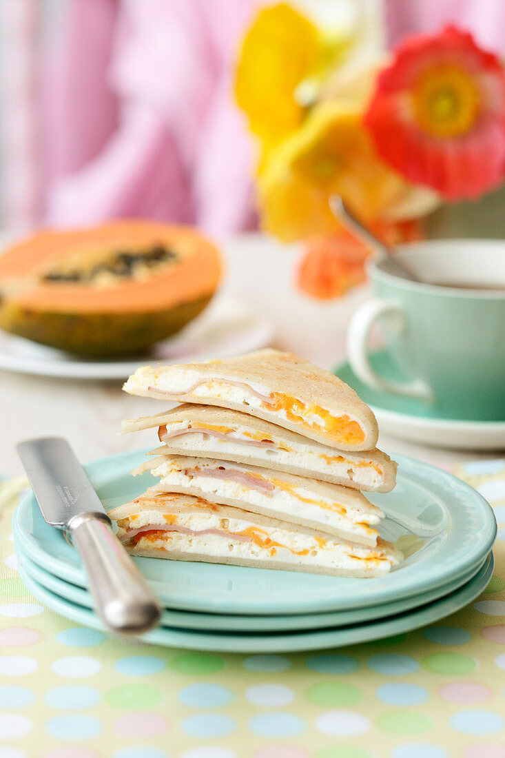 Pancakes filled with ricotta, ham and egg