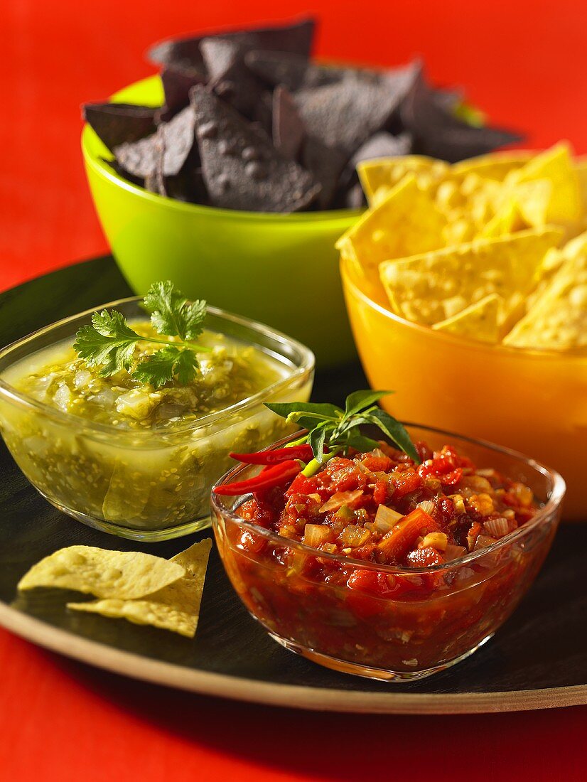 Tomato salsa and salsa verde with tortilla chips