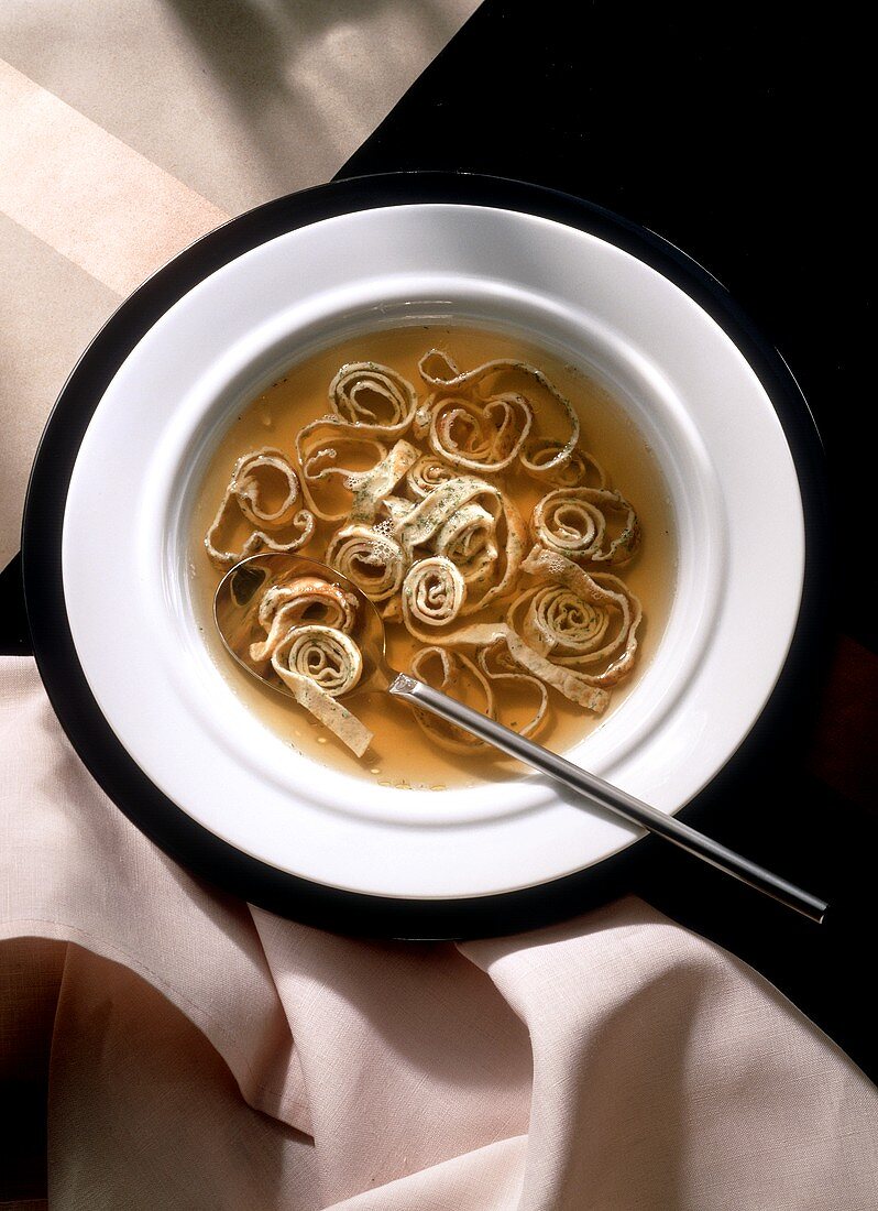 Beef Soup with sliced Herb Pancakes