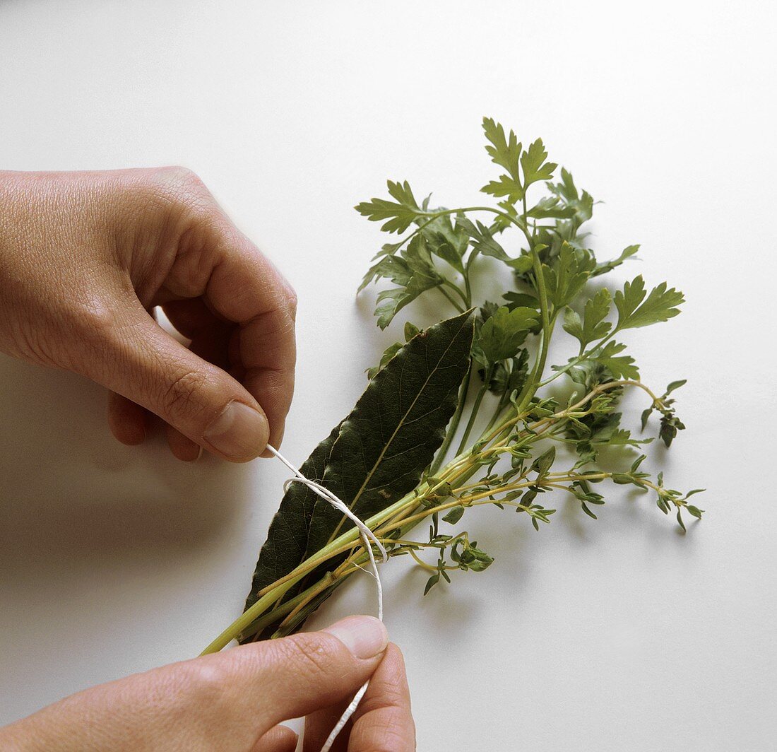 Tying bunches of herbs