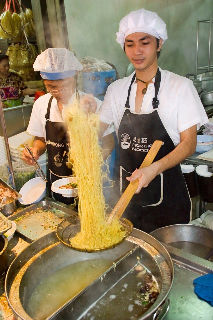 A chef cooking noodle in Bangkok, Thailand