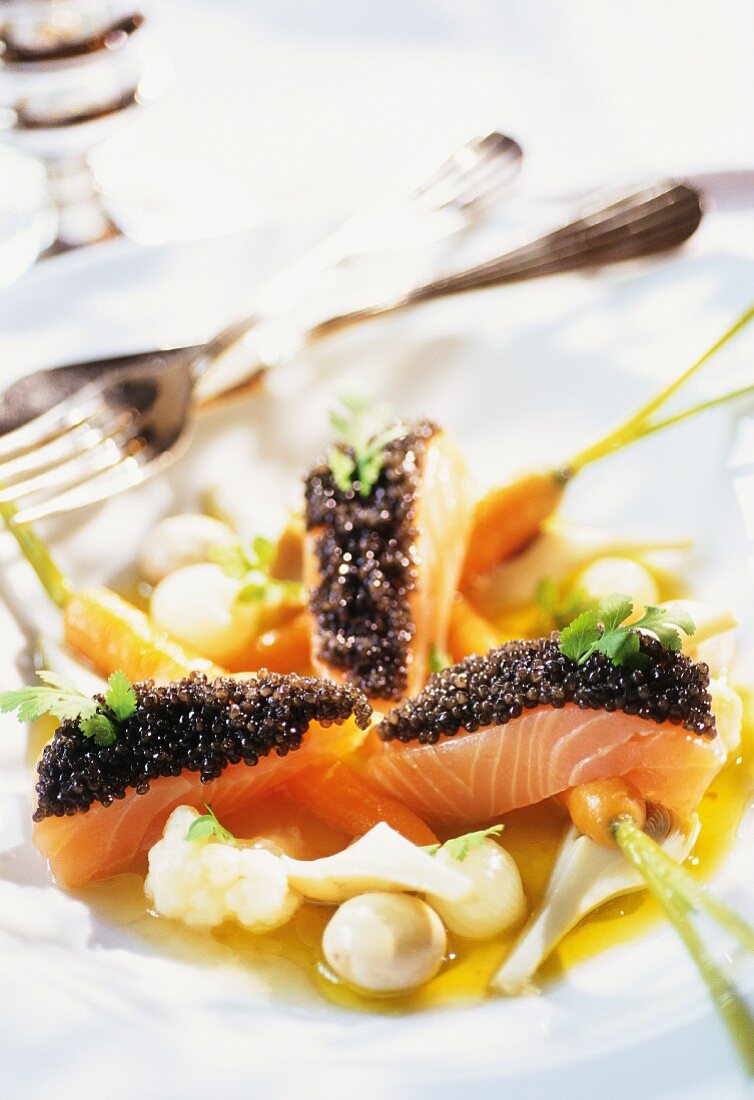 Salmon, caviar and baby vegetables