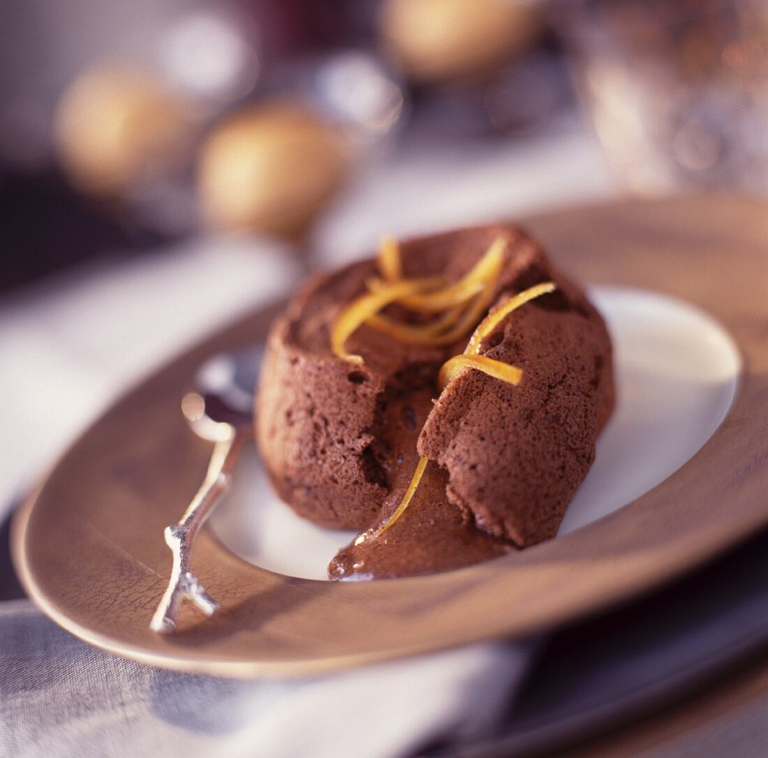 Chocolate sponge dessert with orange sorbet