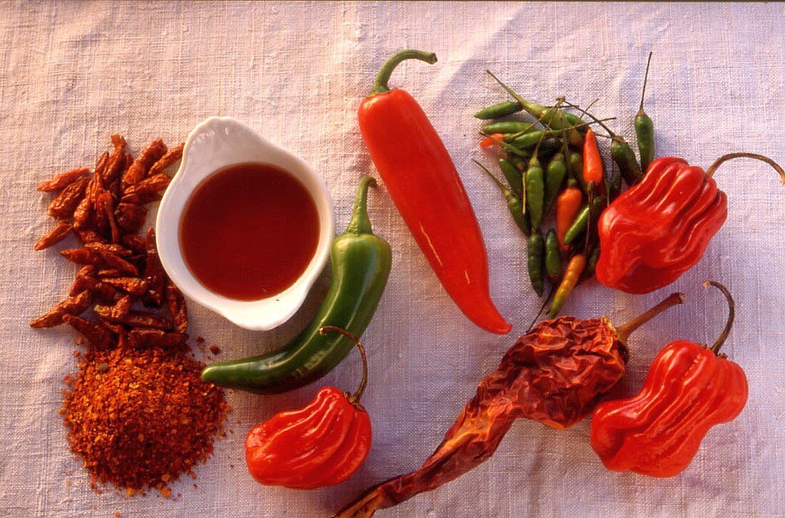 Assortment of raw chili powder and sauce