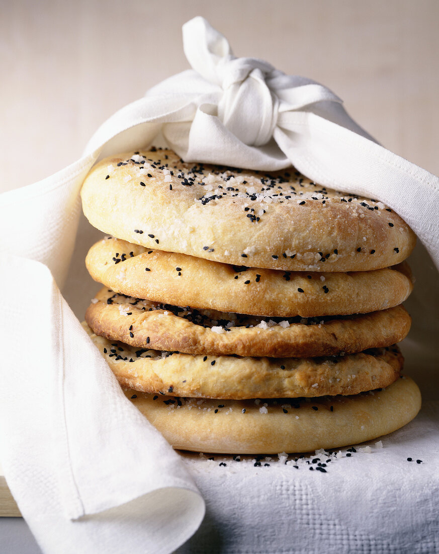 round flat bread in tea towel