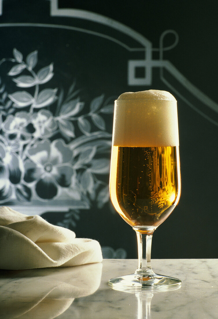 Glass of beer with froth