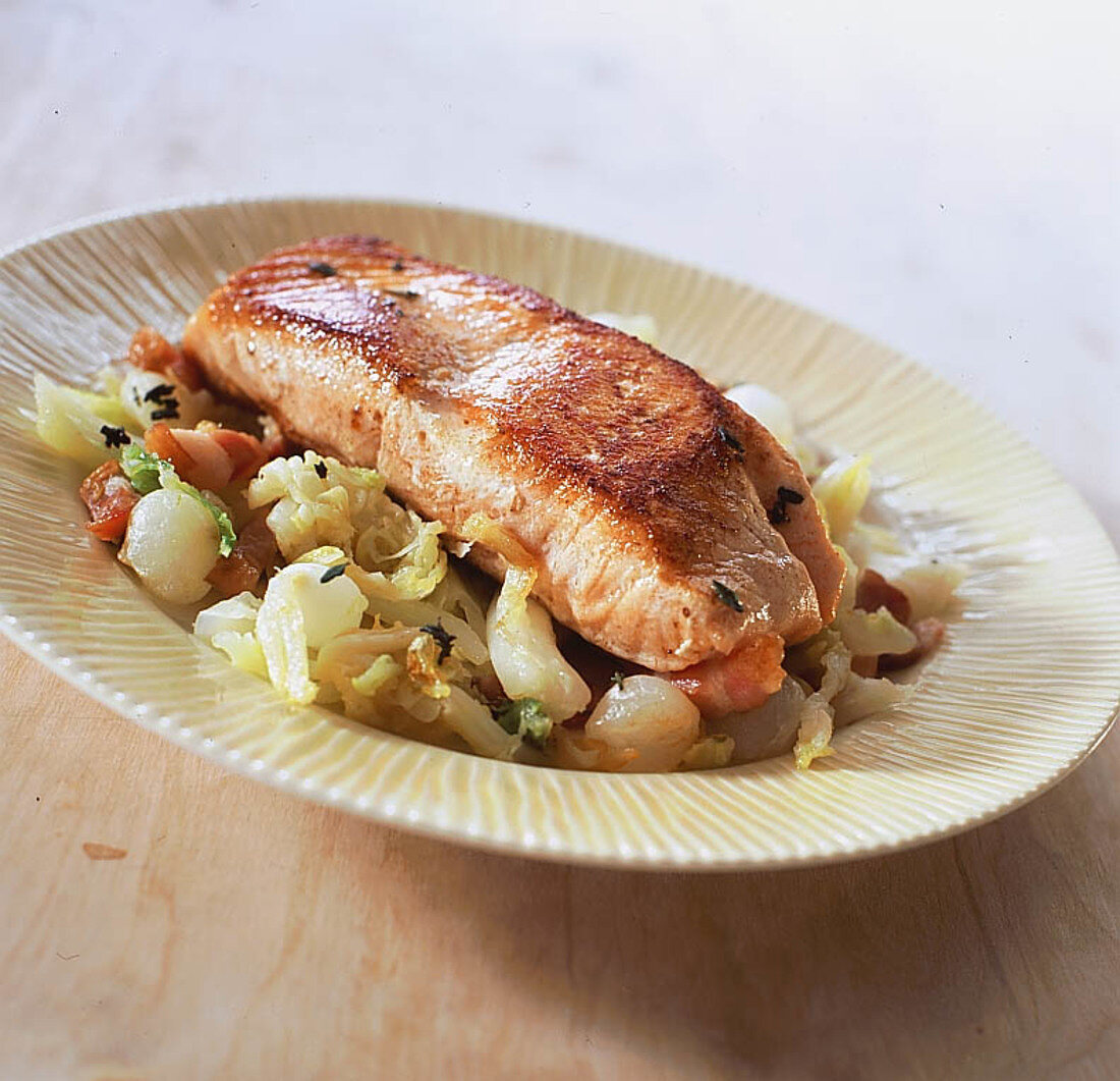 Pan-fried salmon fillet with bourgignonne cabbage and bacon