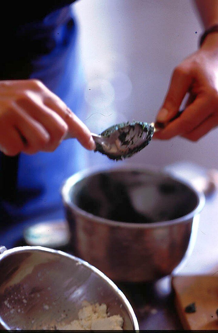 Preparing cakes with ricotta and spinach