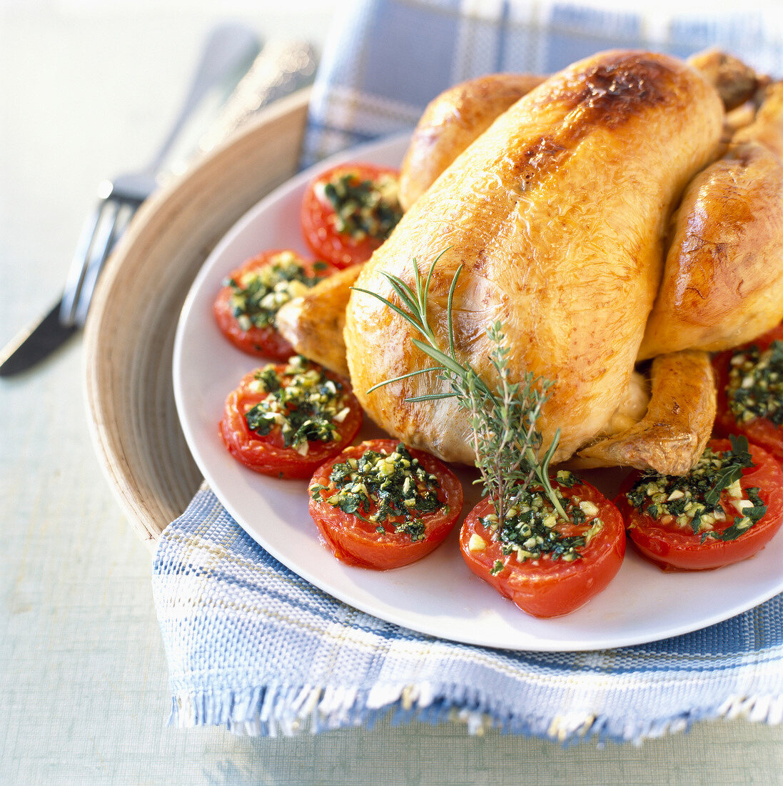 Roast chicken with herb tomatoes