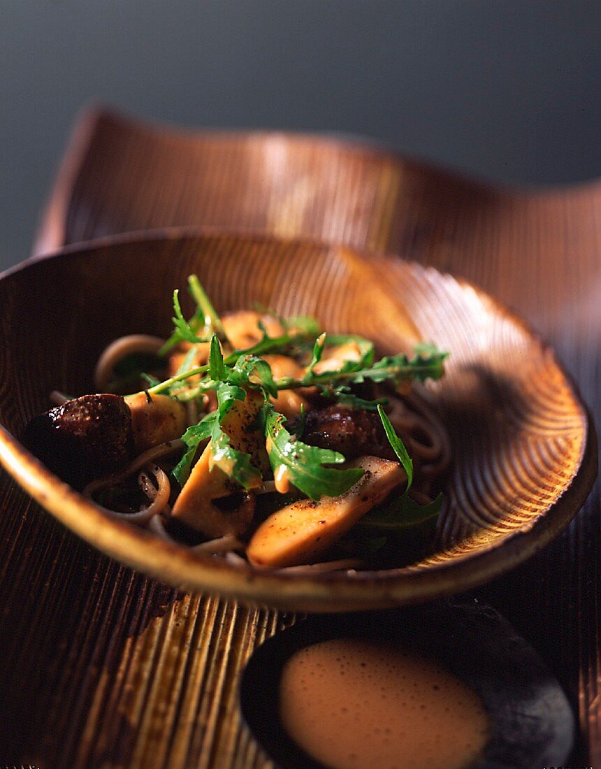 Buckwheat pasta salad with porcini mushrooms in sesame sauce