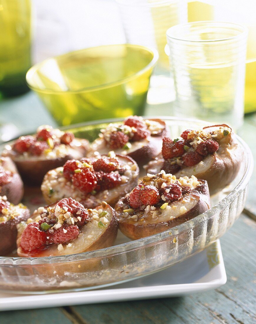 Roasted peaches with almonds and pistachios