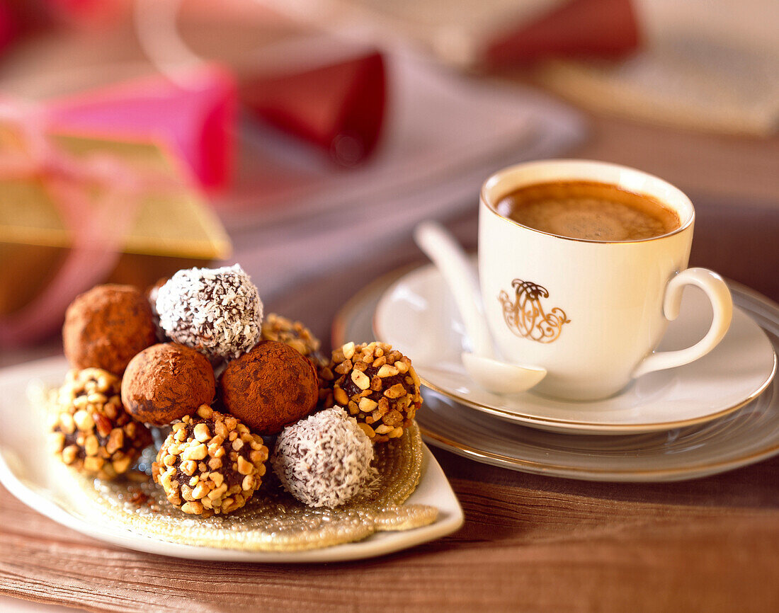 Cup of coffee and chocolate truffles