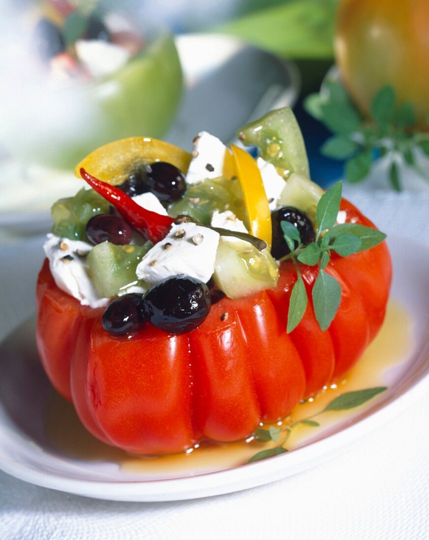 beef tomato stuffed with mozzarella and olives