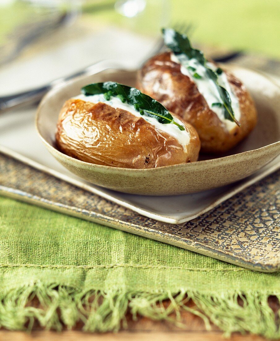 Baked potatoes with fromage frais and herbs