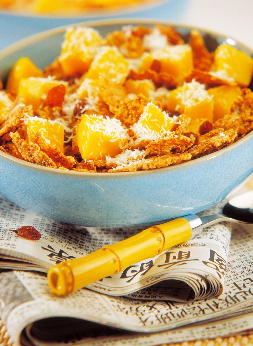 Bowl of cereal with mango and coconut