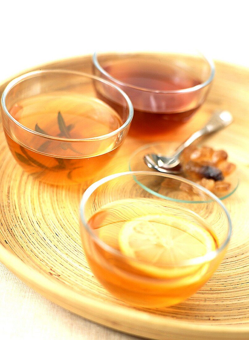 Various herbal teas in glass bottles