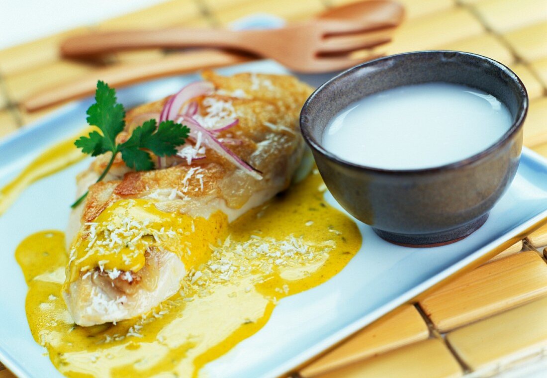 Chicken breast with curry and coconut sauce