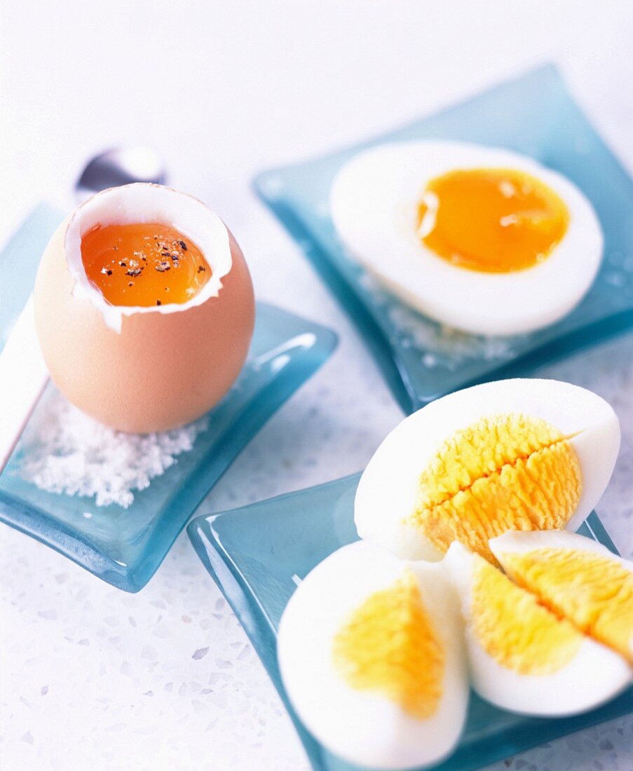 Selection of cooked eggs - soft-boiled, hard-boiled and runny