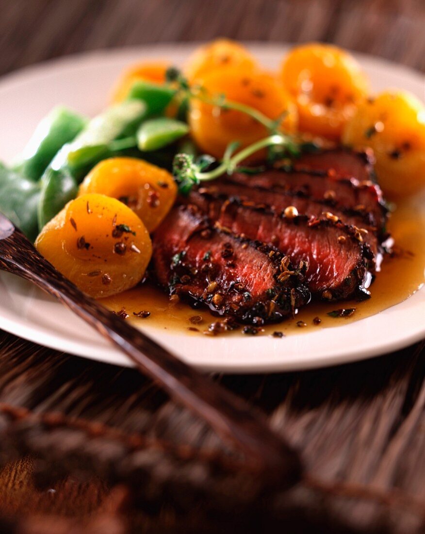 Ostrich steak with apricots