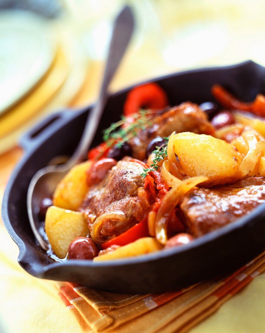 Lamb tajine with olives, peppers and potatoes