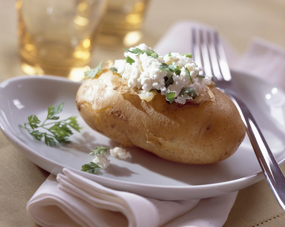 Potato stuffed with fromage frais and herbs