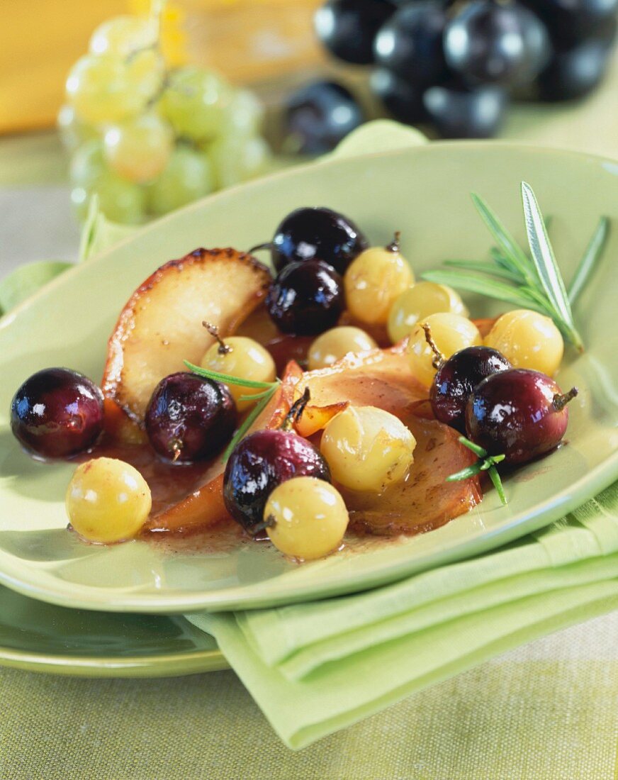 Pan-fried apples and grapes with rosemary