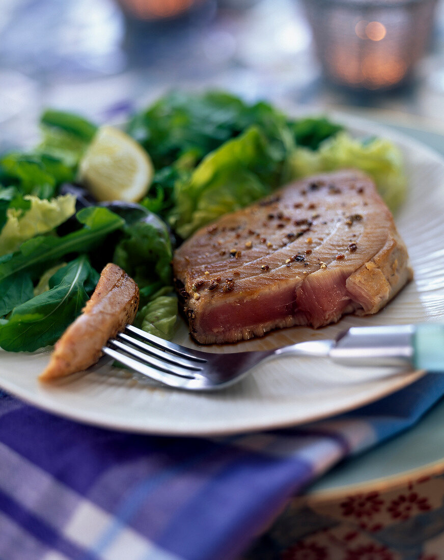 half-cooked tuna with herb leaf salad