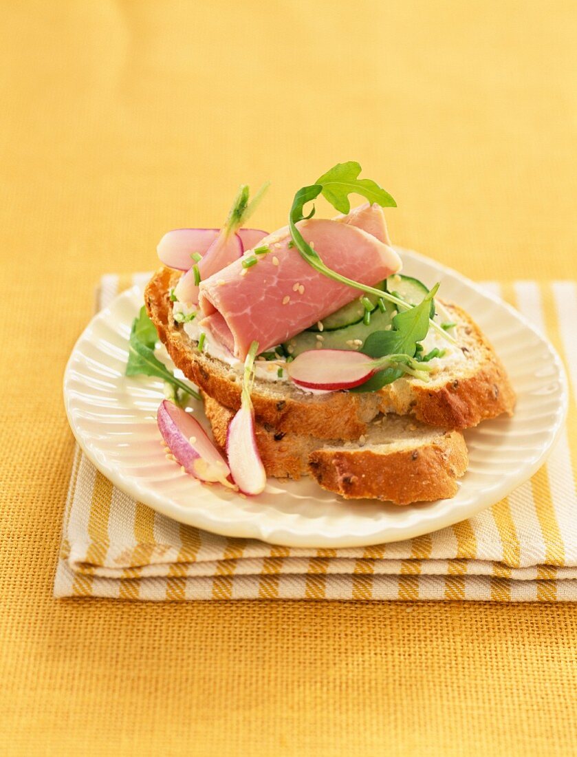 Boiled ham,courgette and radish open sandwich