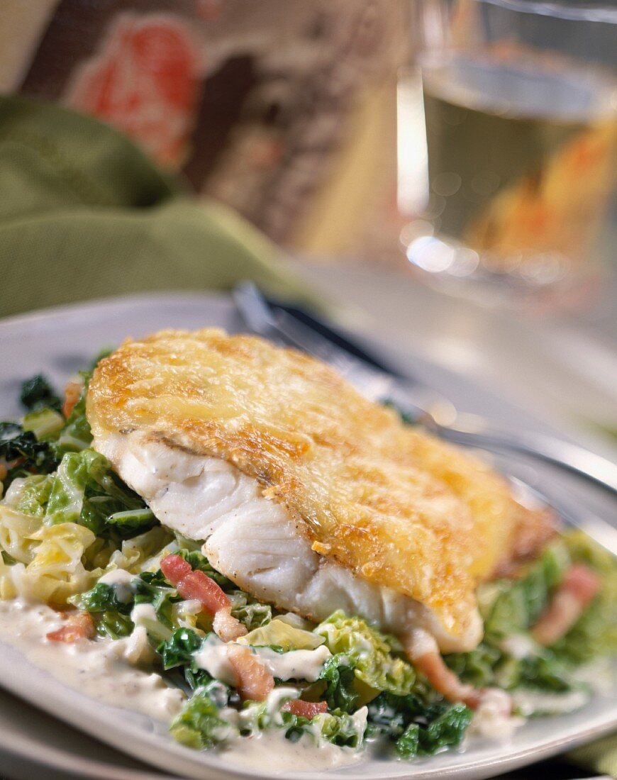 Baked pike-perch steak with grated cabbage