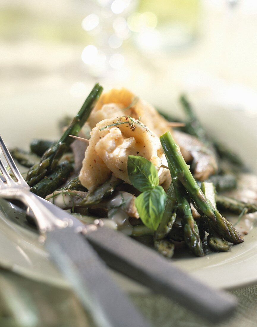 Whiting with asparagus and basil
