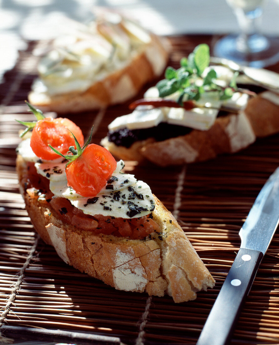 Mozzarella, basil and preserved tomato open sandwich