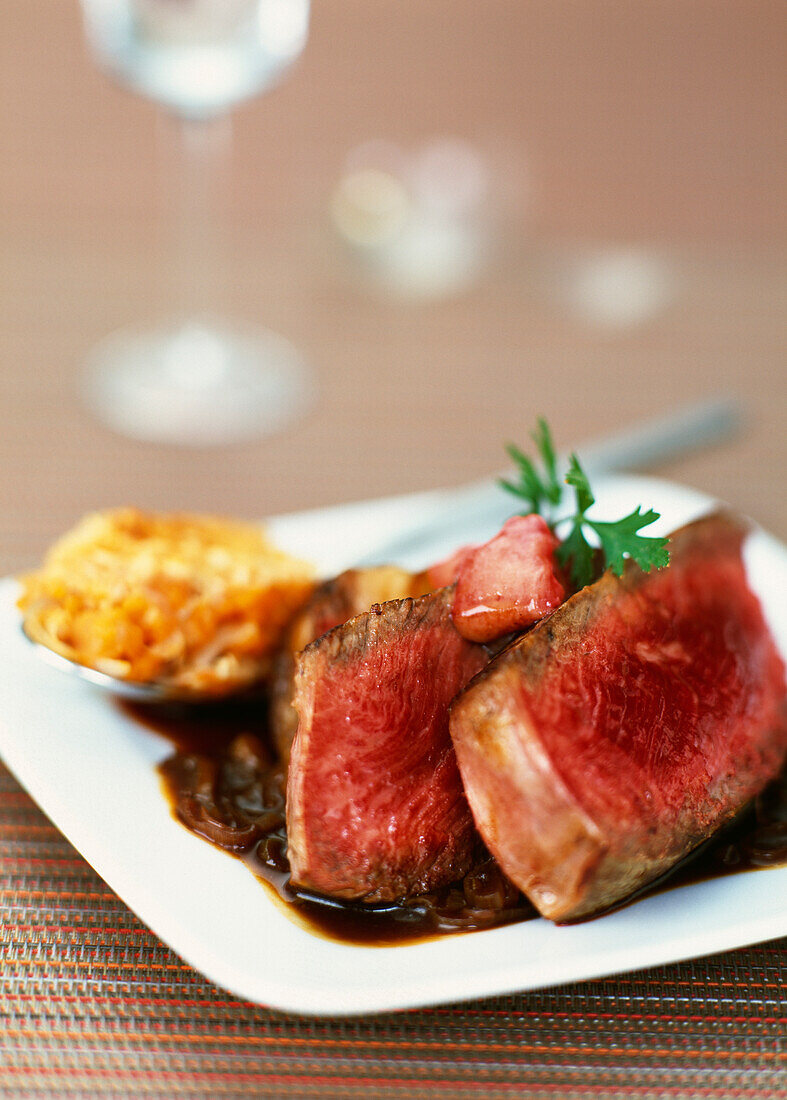 Rib of beef in red wine with baked pumpkin