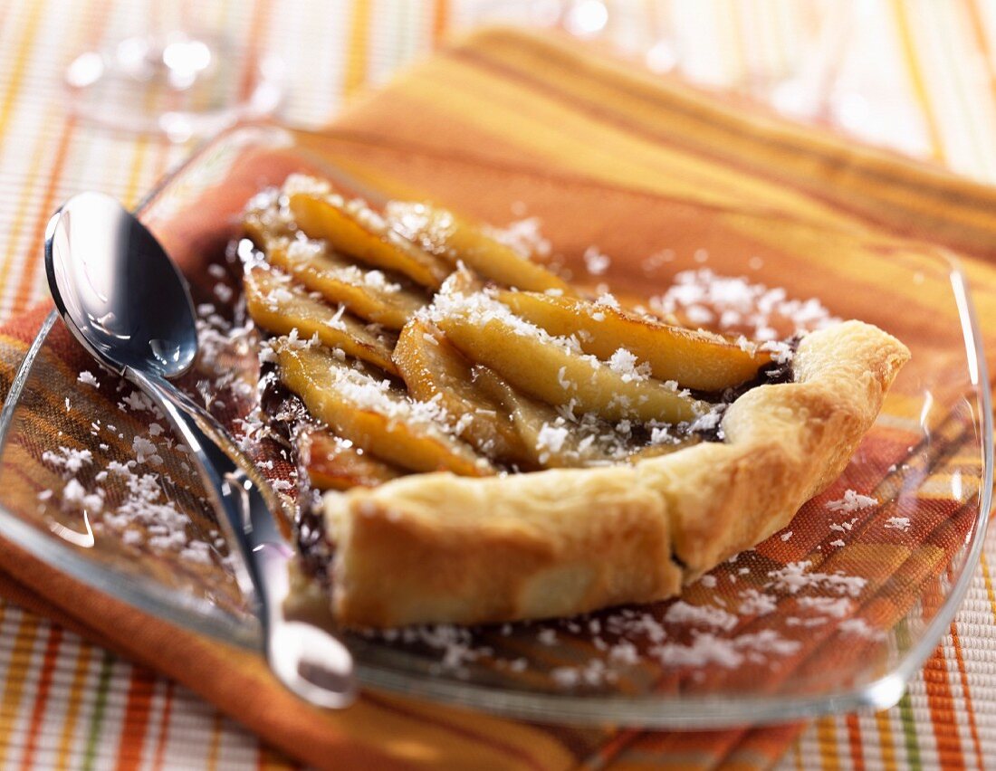 Slice of chocolate and pear tart