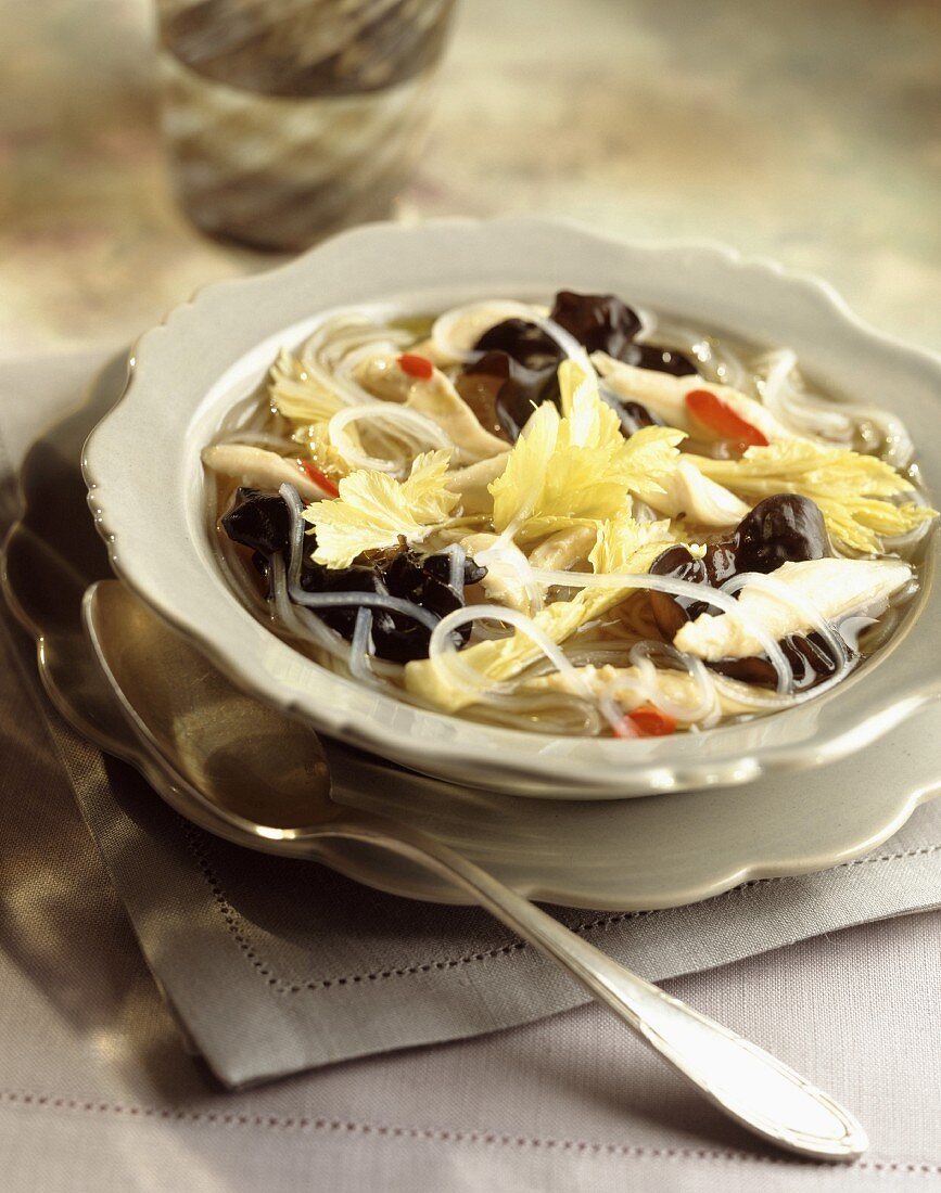 Vermicelli and chicken soup with black mushrooms