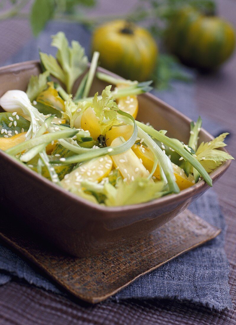 Green tomato, celery and sesame seed salad