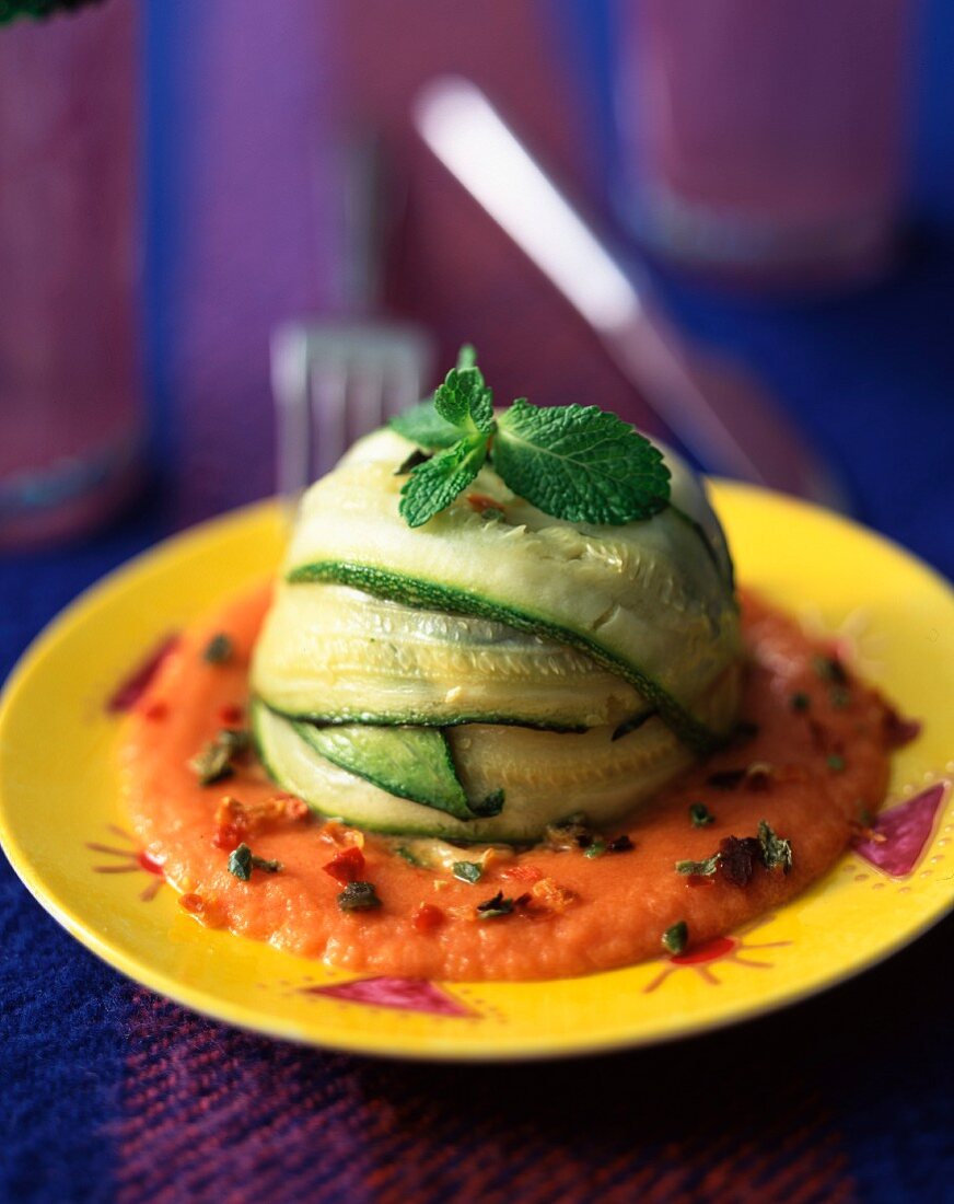 Zucchini dome with spicy hot coulis