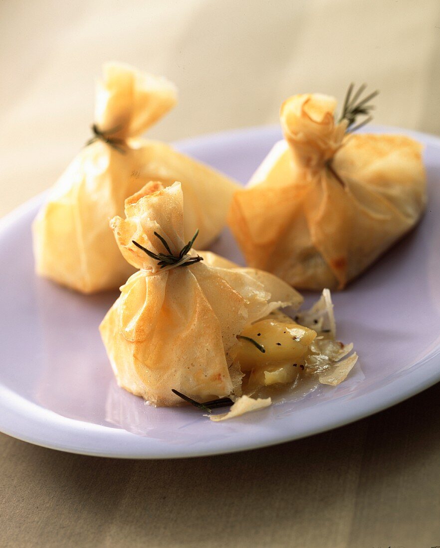 Filo-pastry bundles filled with quince and cheese