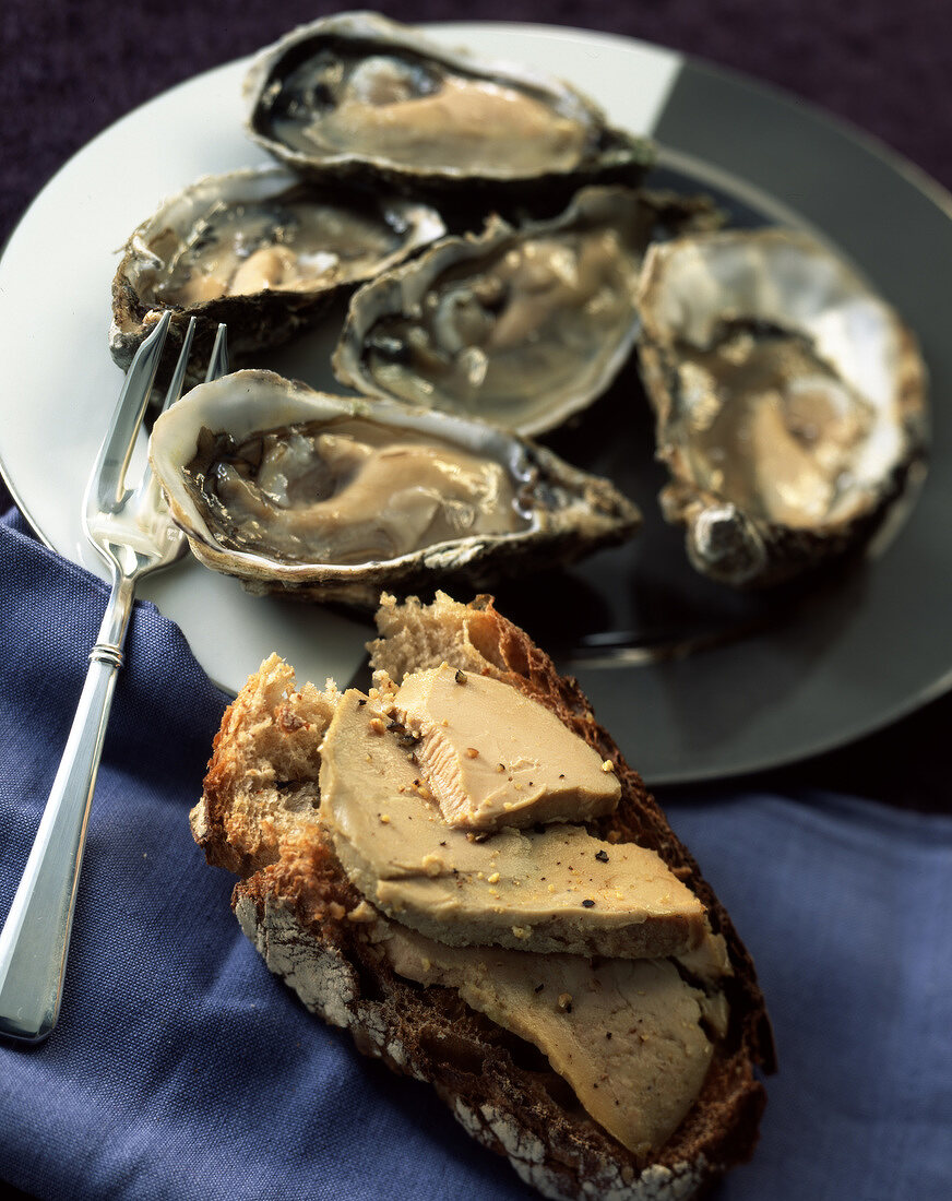 Oysters with foie gras on bread