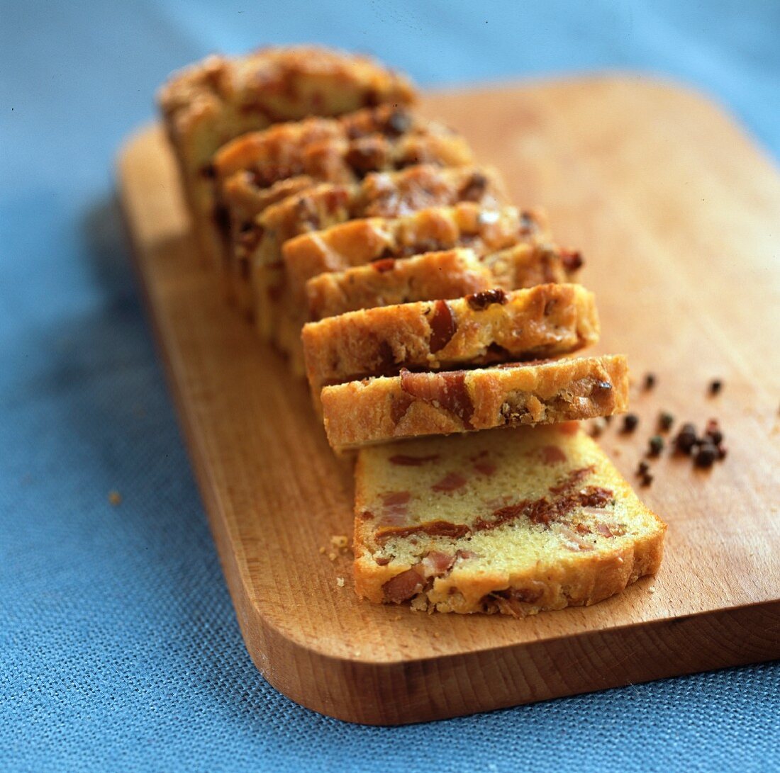 Savoury loaf cake with dried tomatoes and smoked ham