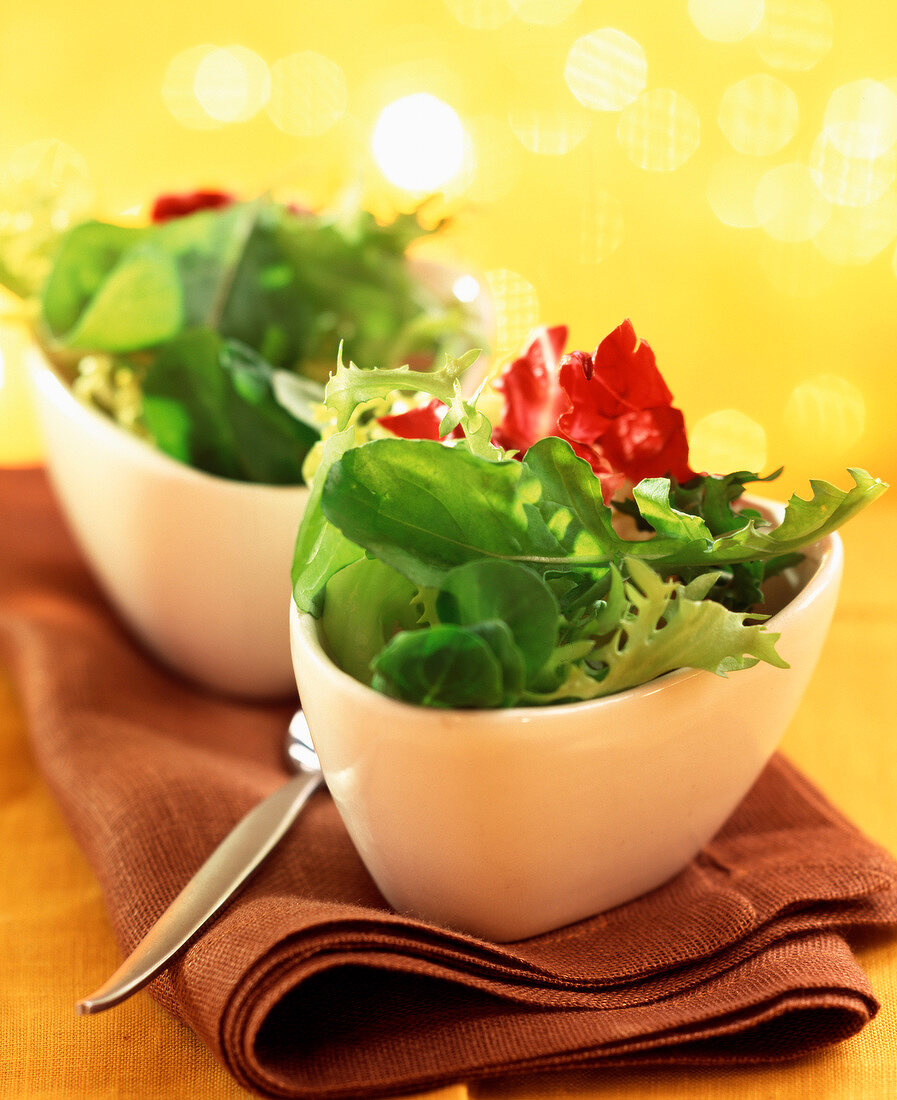 Mixed green salads in bowls
